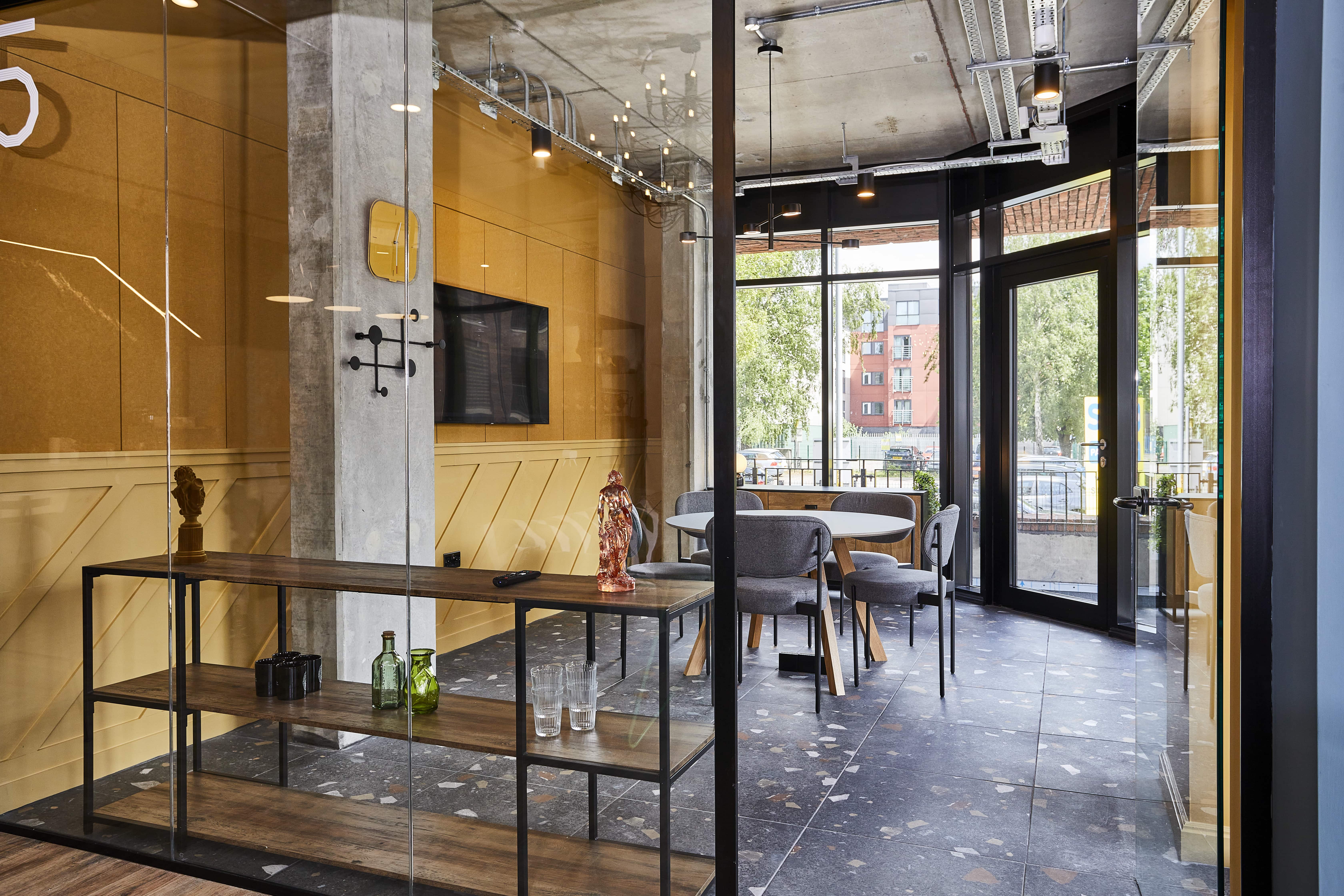 a light and airy meeting room set up 